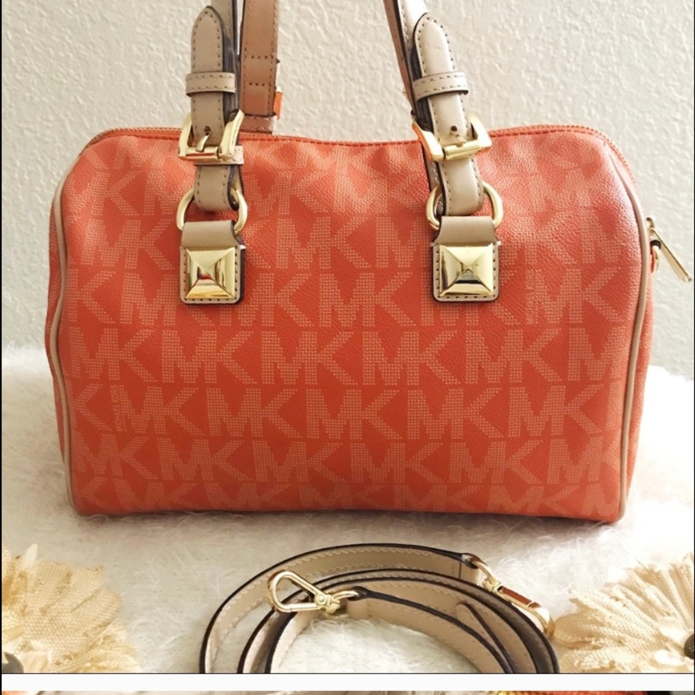 Authentic MK handbag with tan letter straps